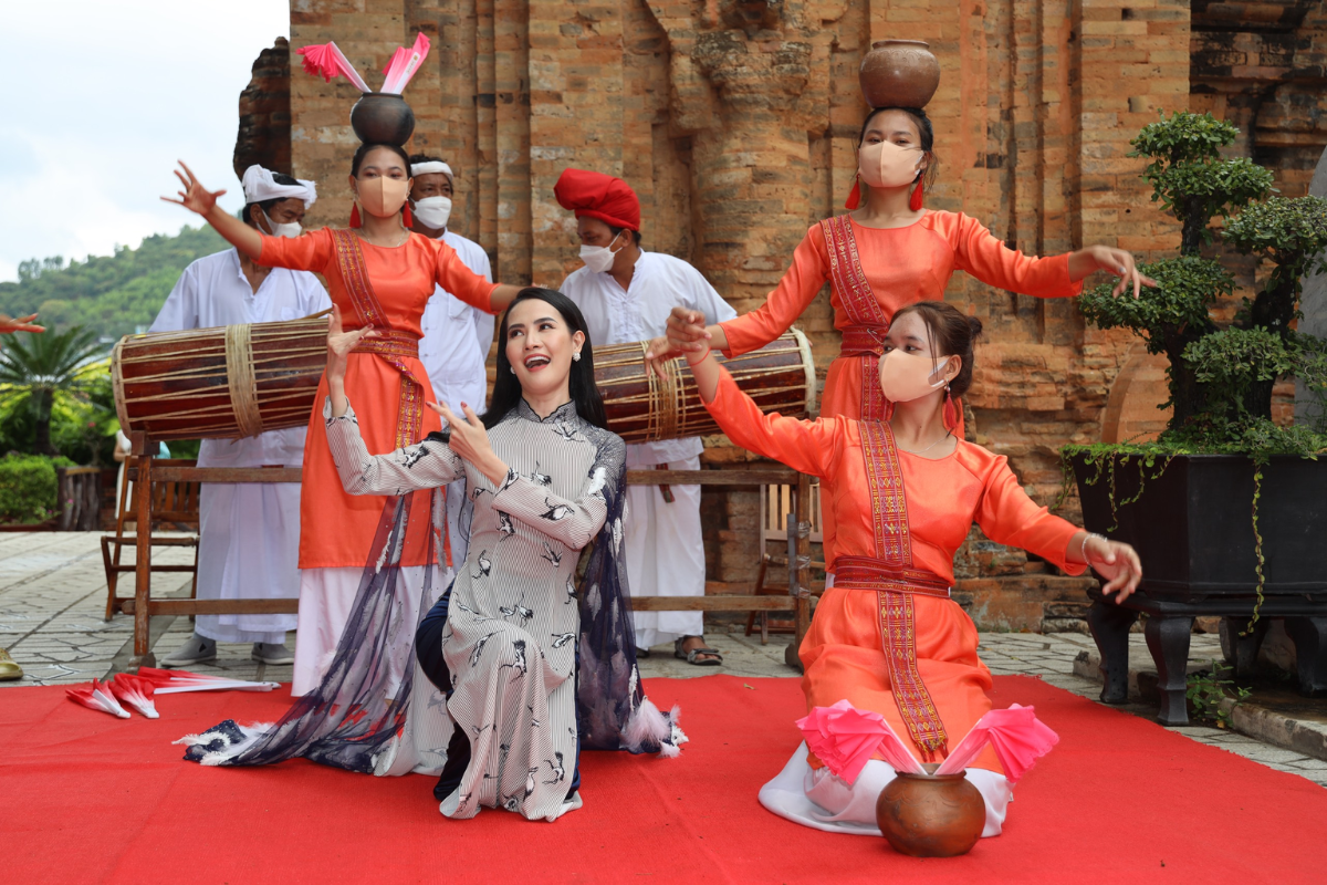 Traditional Cham dance performance at Ponagar Tower Festival with colorful costumes and music